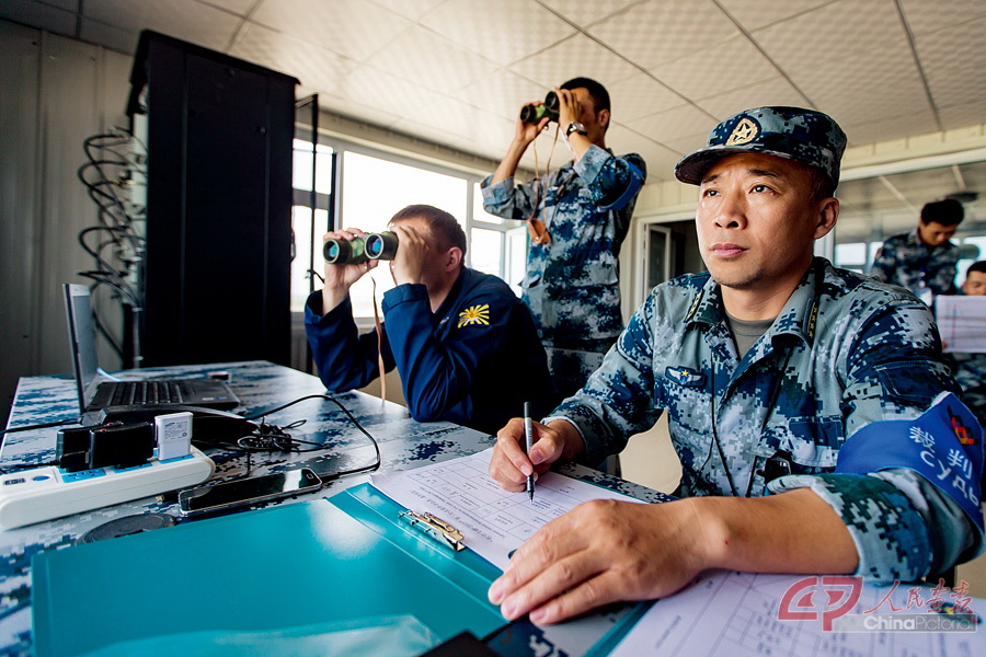 8月9日，第三阶段比赛，中俄裁判共同对打击效果进行评估-杨盼-18953672515.jpg